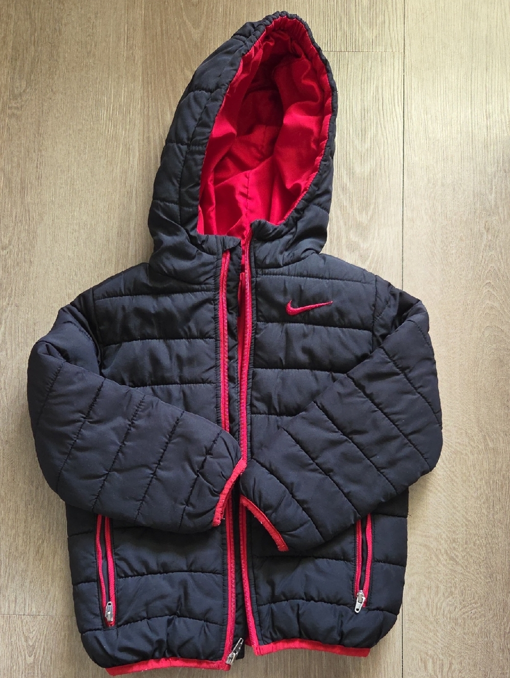 Nike Kids Black Puffer Jacket with Red Trim and Hood